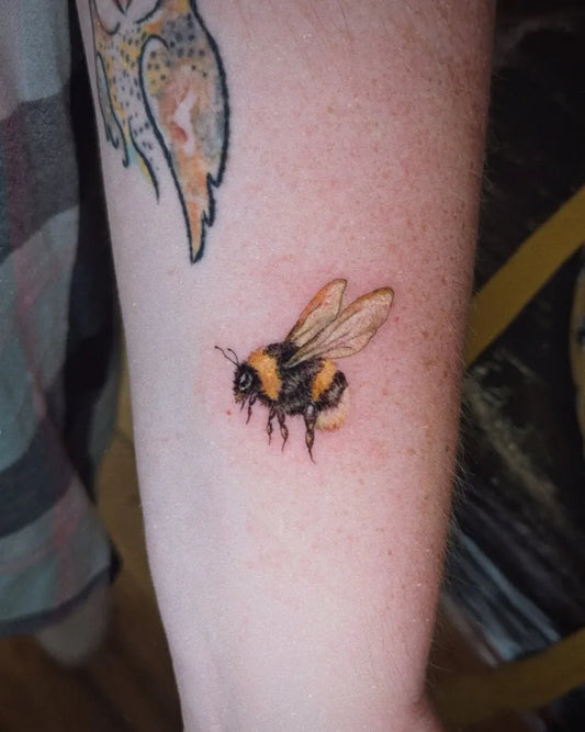 Small Realism Bee on Women Arm Tattoo by @inkyb_tattoo