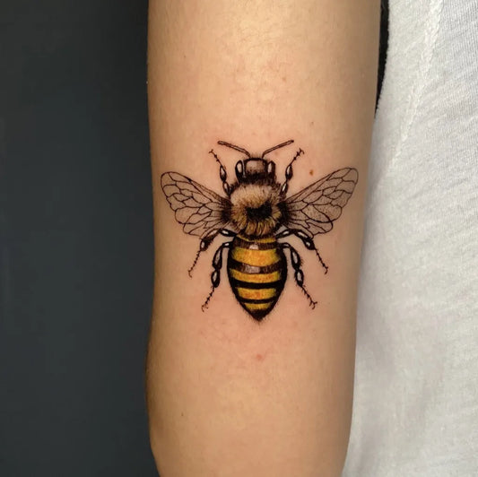 Small Realism Bee on Women Arm Tattoo by @whoscabe