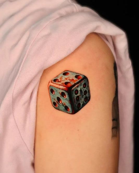 Small Realism Dice Tattoo on Women Shoulder by @mint.vivid