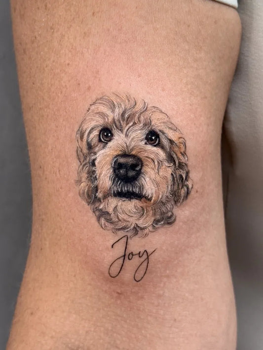 Small Realism Dog Portrait Tattoo on Women Rib by @gabileilek