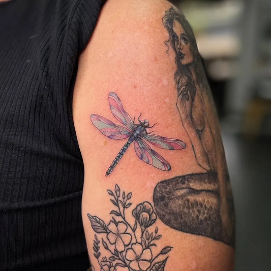 Small Realism Dragonfly Flowers Woman Arm Tattoo by @juliatronwilks