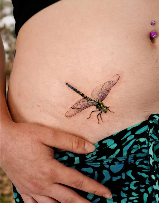 Small Realism Dragonfly on Women Hip Tattoo by @song.e.tattoo