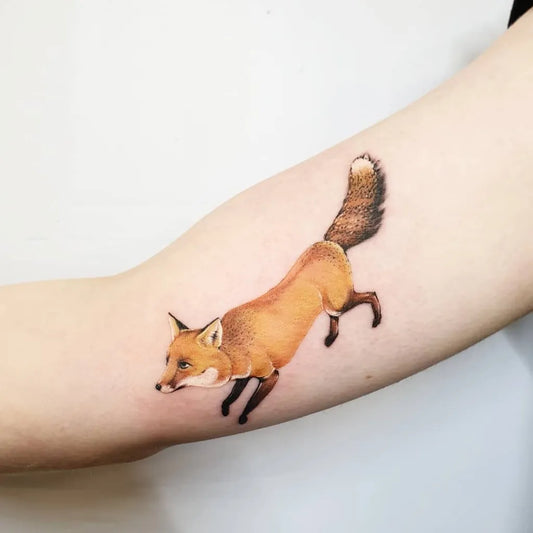 Small Realism Fox Tattoo on Women Bicep by @leehumphs_tattoo