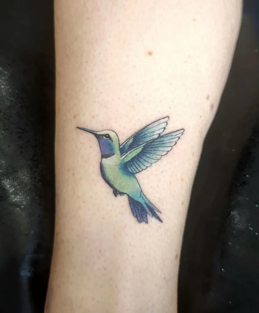 Small Realism Hummingbird on Women Arm Tattoo by @5thstreetinktattoo