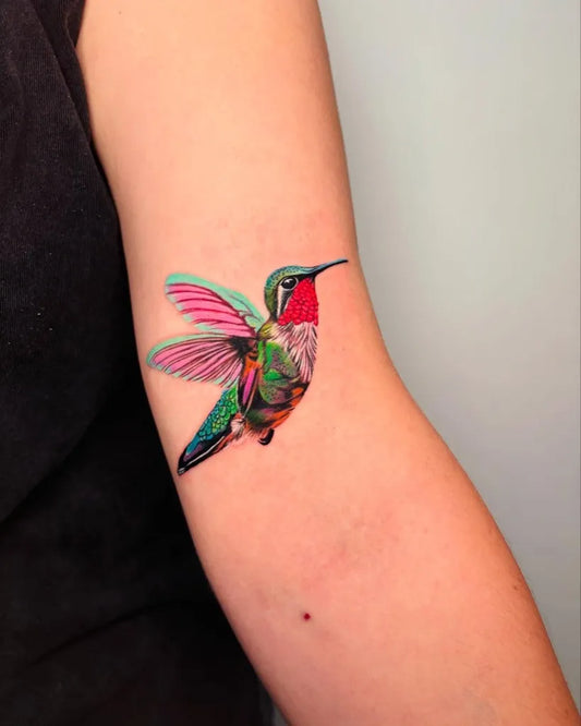 Small Realism Hummingbird on Women Arm Tattoo by @hoa.baker.ink