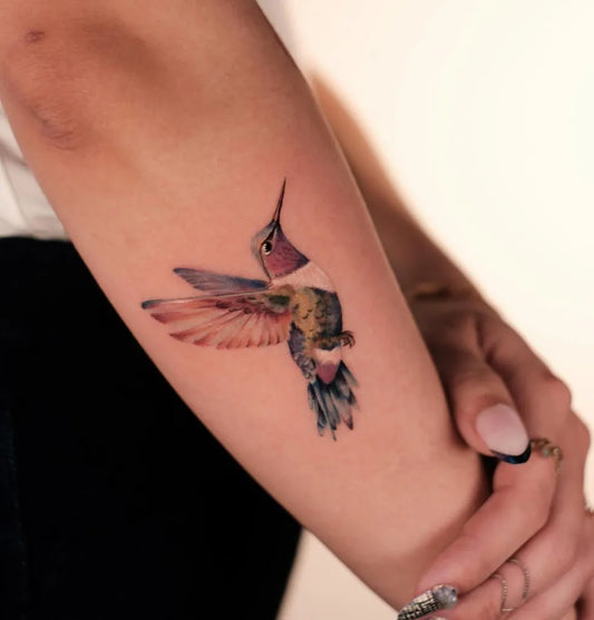 Small Realism Hummingbird on Women Arm Tattoo by @lilis.tattoo