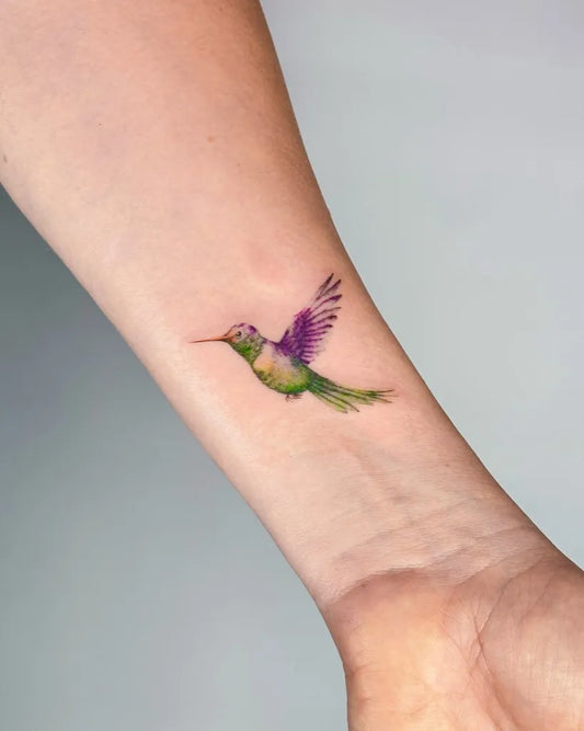 Small Realism Hummingbird on Women Arm Tattoo by @zilandogantattoo