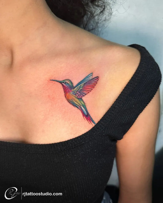 Small Realism Hummingbird on Women Shoulder Tattoo by @rjtattoosindia