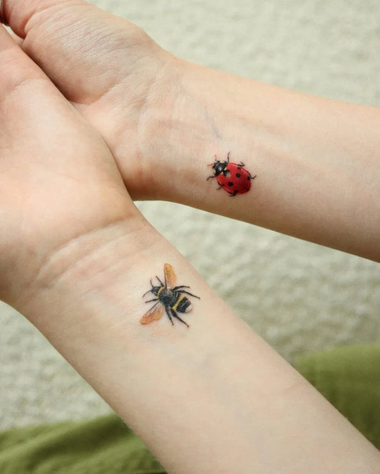 Small Realism Ladybug and Bee Tattoo on Women Wrist by @saegeemtattoo