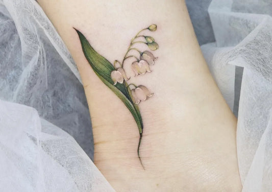 Small Realism Lily of the Valley Women Ankle Tattoo by @yshiww