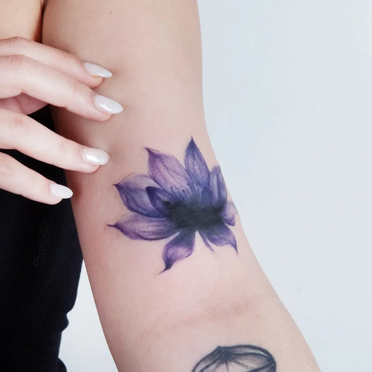 Small Realism Lotus Flower on Women Arm Tattoo by @rafibatu