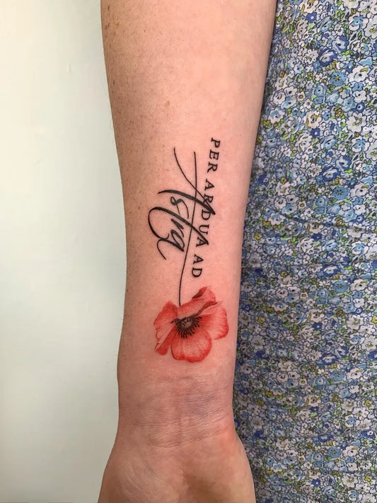 Small Realism Poppy and Latin Text Tattoo on Women Forearm by @zoe.tattooartist