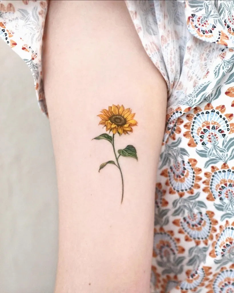 Small Realism Sunflower on Women Arm Tattoo by @palette.tt