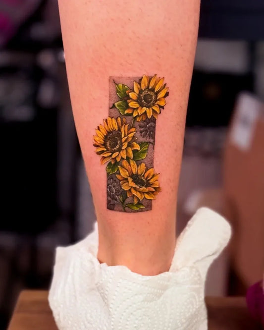 Small Realism Sunflowers and Leaves on Women Ankle Tattoo by @wixien_artworks