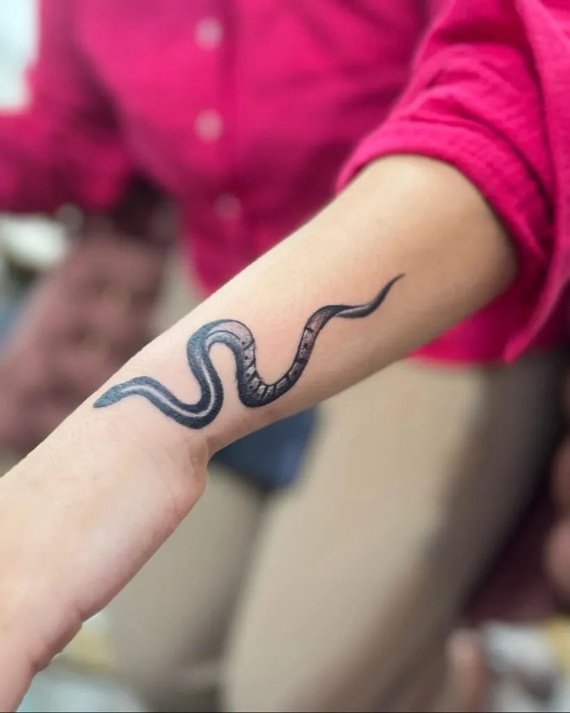 Small Realistic Snake on Women Arm Tattoo by @inkfytattoo