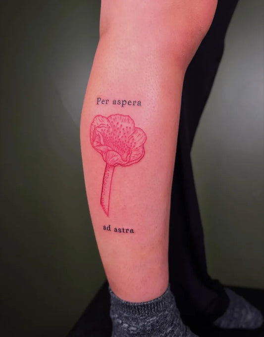 Small Red Flower and Latin Text Tattoo on Women Leg by @lexcreotattoos