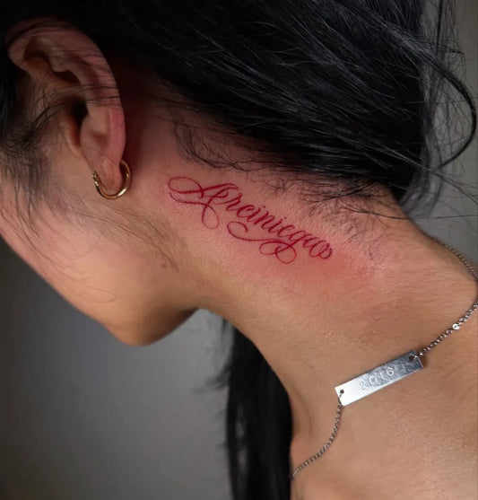 Small Red Script Name Tattoo on Women Neck by @slapitonink