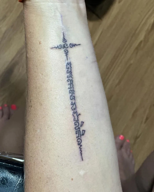 Small Sak Yant Sak Yant Script Tattoo on Women Wrist by @preservation_khmer_sakyant