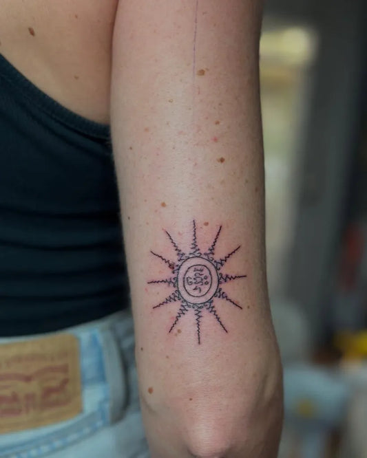 Small Sak Yant Yant Gaew Tattoo on Women Arm by @preservation_khmer_sakyant