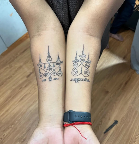 Small Sak Yant Yant Ha Taew Tattoo on Women Forearms by @preservation_khmer_sakyant