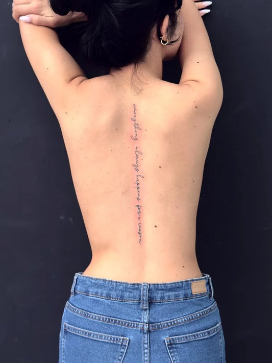 Small Script Inspirational Quote on Women Spine Tattoo by @skullink_tattoo