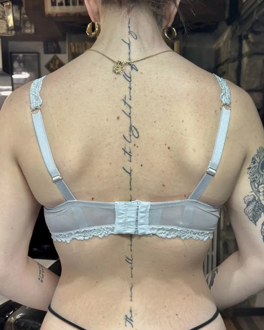 Small Script Let It All Go on Women Spine Tattoo by @vonredd