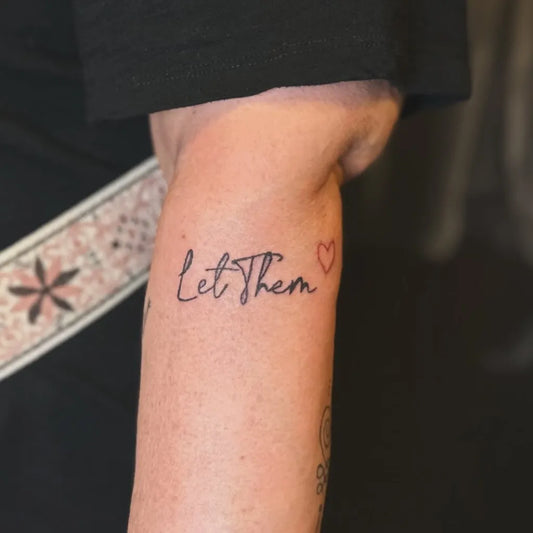 Small Script Let Them Heart on Women Forearm Tattoo by @thegirlwhostabs