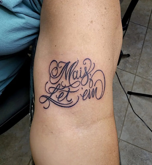 Small Script Let Them on Women Arm Tattoo by @derekwaynetattoos