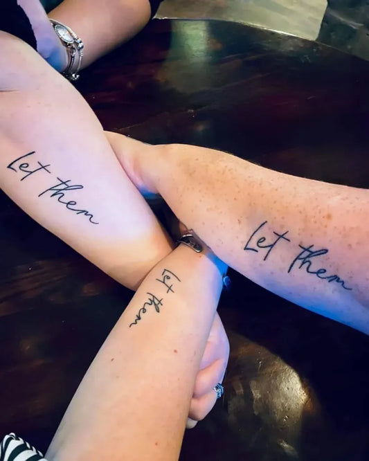 Small Script Let Them on Women Arm Tattoo by @karagh98