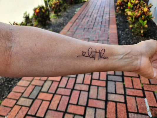 Small Script Let Them on Women Arm Tattoo by @pinkysplacewh