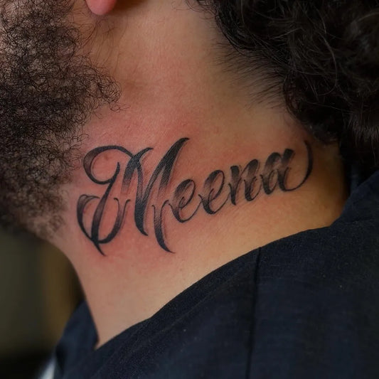 Small Script Meena on Men Neck Tattoo by @mister_andy89