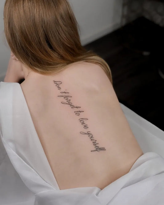 Small Script Quote on Women Spine Tattoo by @tattoobyregino