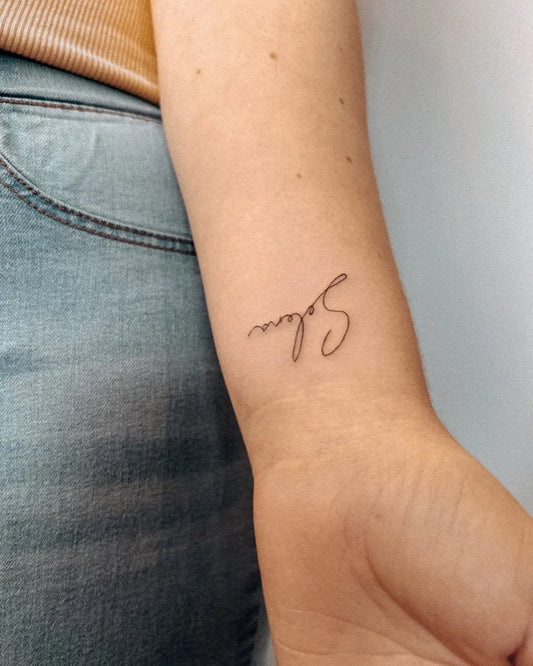 Small Script Self Word on Women Wrist Tattoo by @toritattoouk