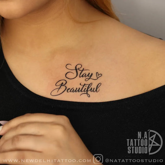 Small Script Text Heart Tattoo on Women Collarbone by @natattoostudio