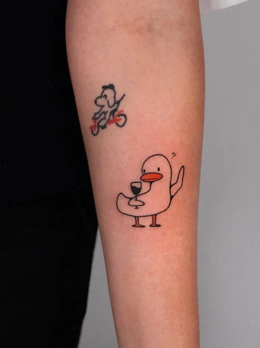 Small Stick and Poke Duck with Wine Glass and Dog on Bike Tattoo on Women Forearm by @dontleavemealoan