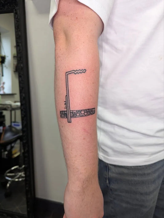 Small Stick and Poke Hammer and Sickle Tattoo on Men Arm by @starttodaytattoo