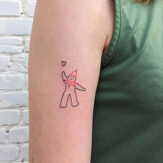 Small Stick and Poke Stick Figure Clown with Heart Tattoo on Women Arm by @toetoeloes