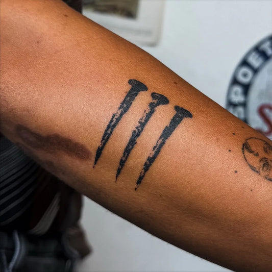 Small Stick and Poke Three Nails Tattoo on Women Arm by @handpokeforever