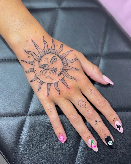 Small Sun and Moon Linework on Women Hand Tattoo by @lucie.tattoo