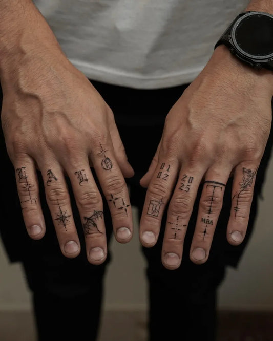 Small Symbolic Runes and Crosses on Men Hands Tattoo by @natashia.ink