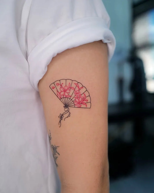 Small Traditional Cherry Blossom Fan on Women Arm Tattoo by @yeowool_tattooer