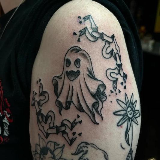 Small Traditional Ghost Daisy Tattoo on Women Arm by @toadstattoos
