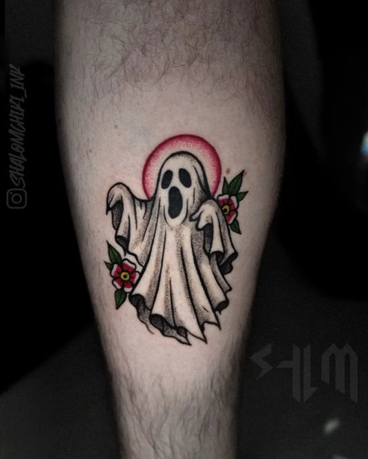 Small Traditional Ghost with Flowers Tattoo on Men Leg by @shalomchiki_ink
