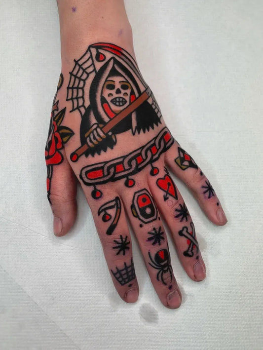 Small Traditional Grim Reaper Rose Spider on Women Hand Tattoo by @alberto_df_tattooer