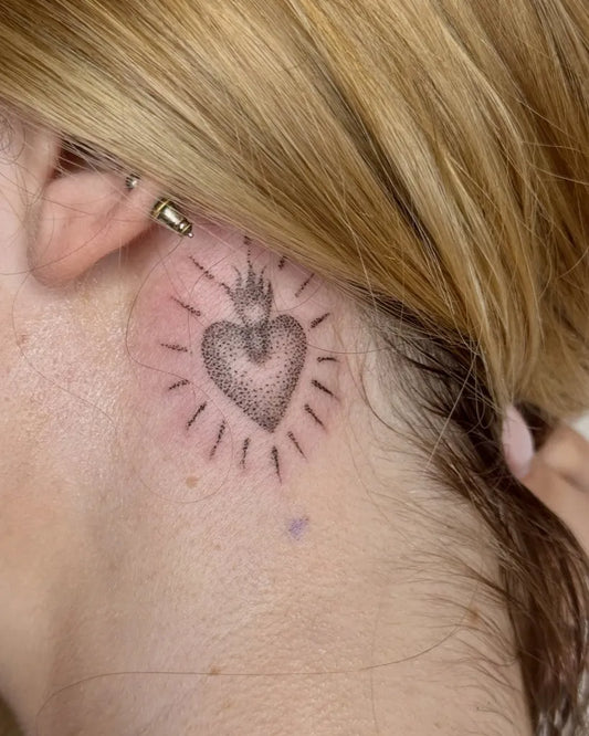 Small Traditional Heart with Sacred Heart on Women Neck Tattoo by @googoo.tat