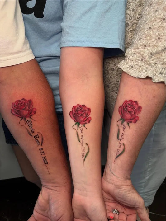 Small Traditional Rose Script Family Tattoo on Women Arm by @_solaink