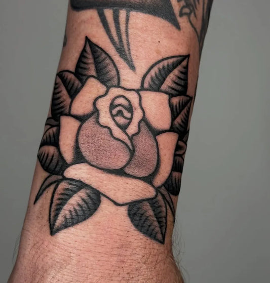 Small Traditional Rose on Men Wrist Tattoo by @aaronprego