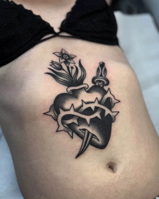 Small Traditional Sacred Heart on Women Sternum Tattoo by @alxgracia