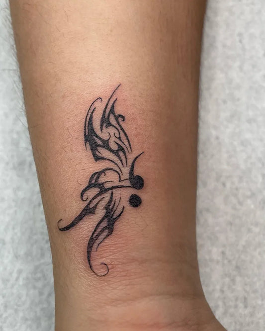 Small Tribal Butterfly with Semicolon on Women Wrist Tattoo by @tayloromb
