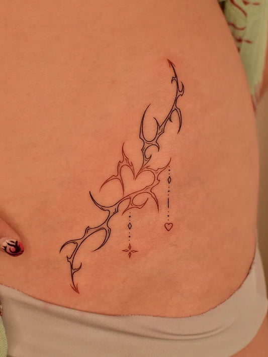 Small Tribal Heart on Women Abdomen Tattoo by @tattooer_jina